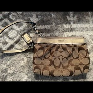 Coach metallic gold wristlet